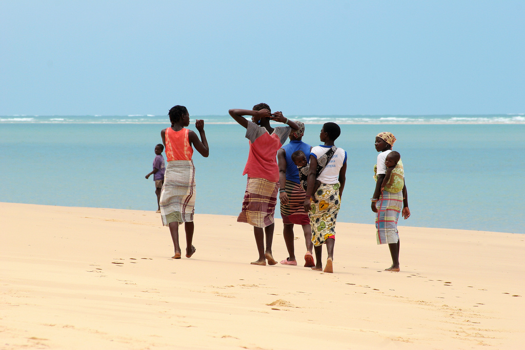 Ladies walking along Bazaruto Island in Mozambique.