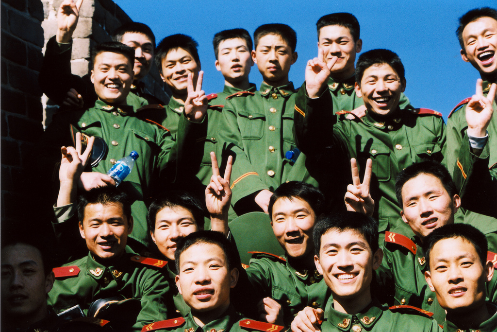A bunch of happy officers at the Great Wall in China.