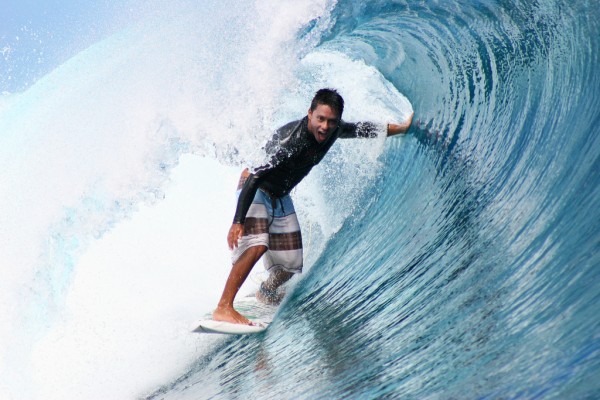 dennis-tihara-tube-surfing-teahupoo-tahiti Pro-surfer Dennis Tihara knows how to tame these waves.