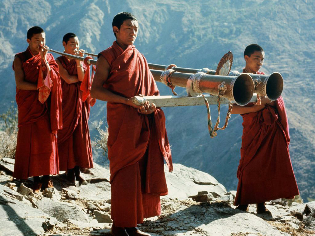 Tibetan monks. Photo credit unknown.