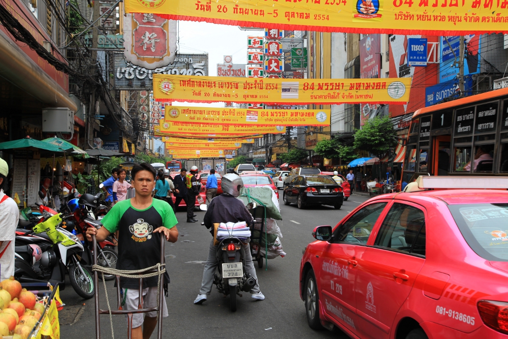 Yellow banners at Charoen Krund Road in Bangkok.