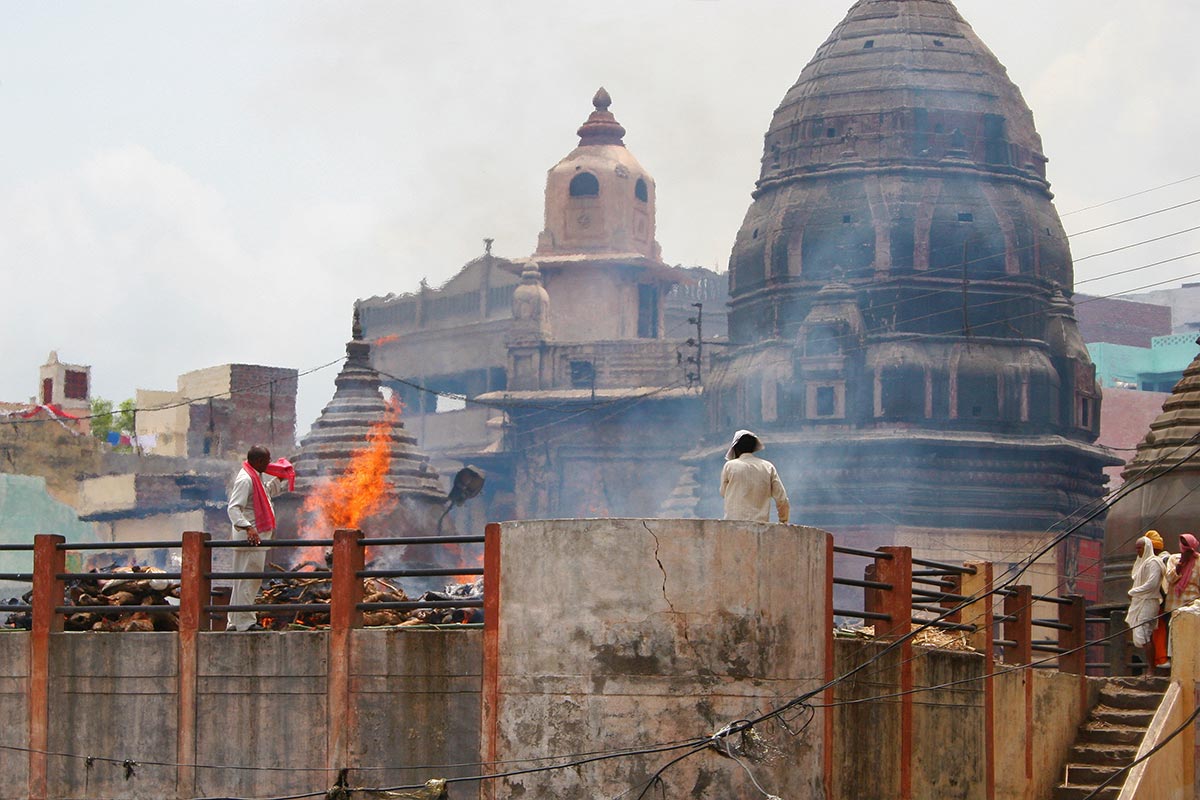 The city of Varanasi has nearly 100 ghats. Most of them are bathing and ceremony ghats, while a few are used exclusively as cremation sites, like the one you can see in the above image.