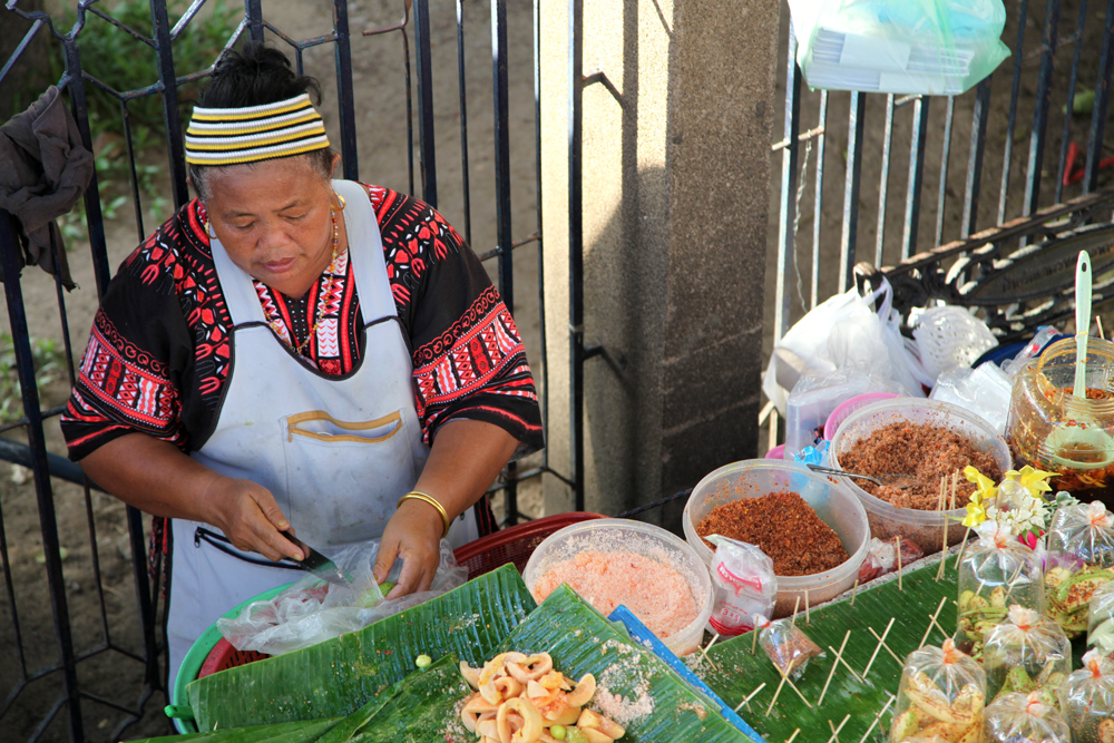 Food vendor at Chatuchak market in Bangkok, Thailand.