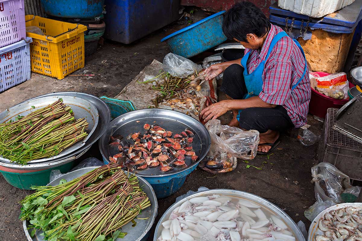 Street vendors can be found all around Khlong Toey fresh market.