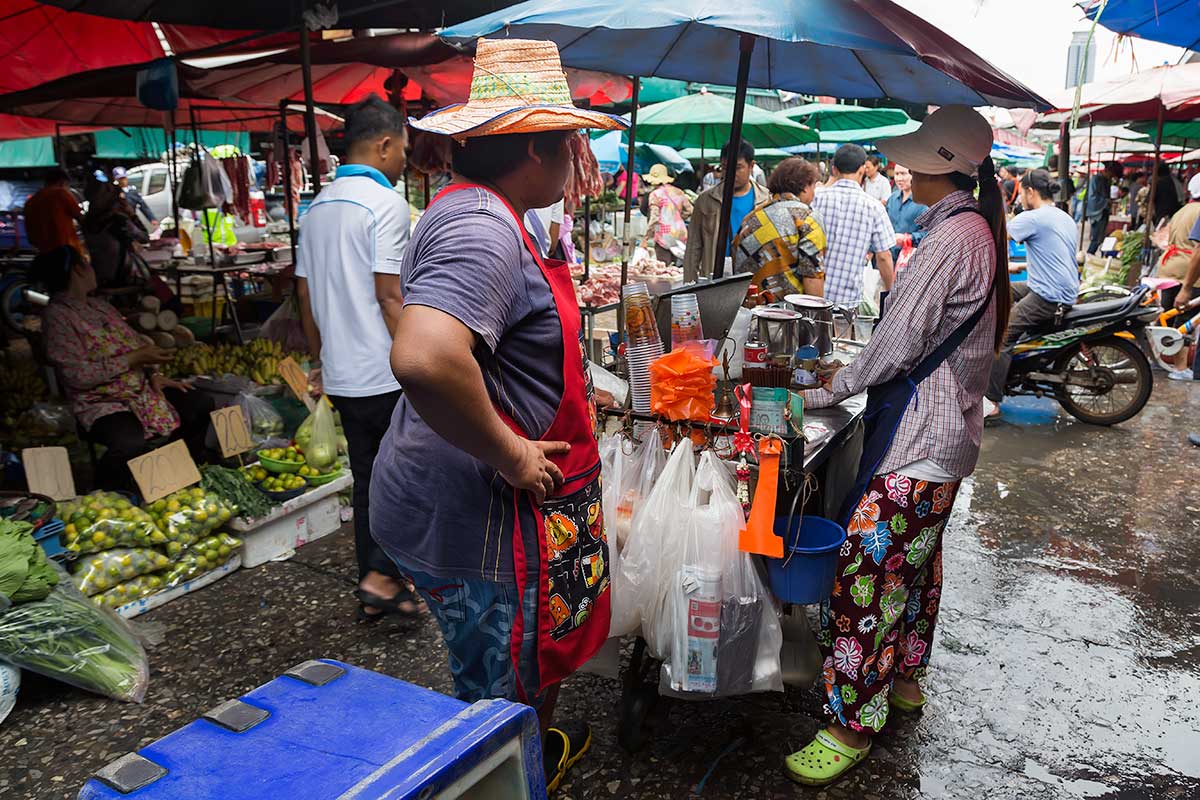 A small, hidden village deep within the Bangkok busy city jungle; Khlong Toey fresh market seems to have a life of its own.