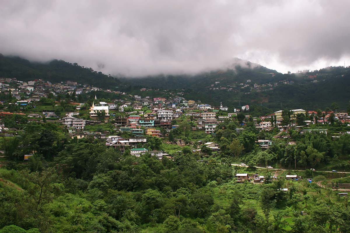 The town of Kohima is located on the top of a high ridge and the town serpentines along the top of the mountain ranges as is typical of most Naga settlements.