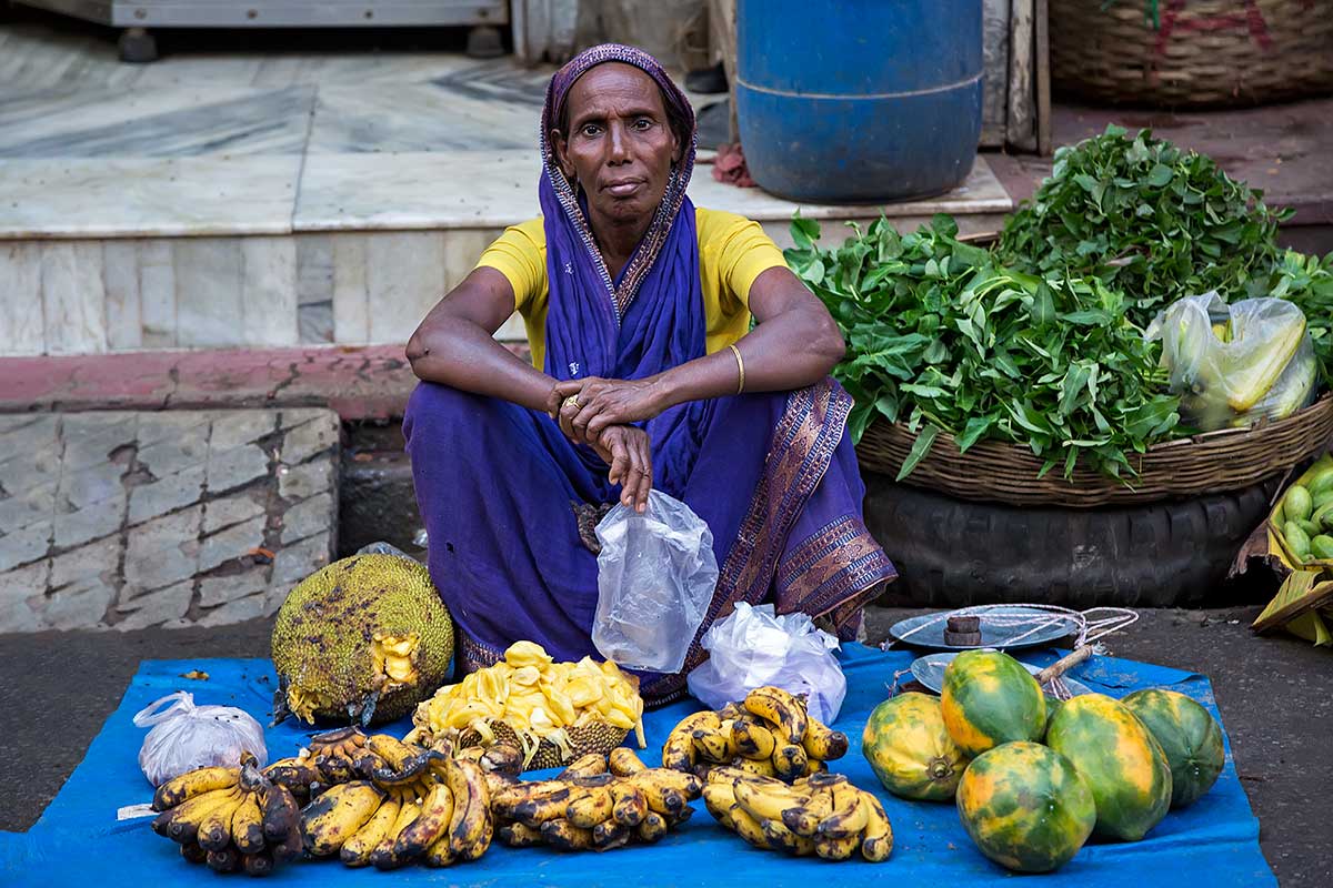 vegetable-market-woman-selling-goods-guwahati-assam-india