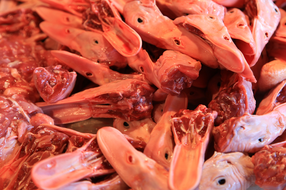 Duck peckers at a market in Bangkok, Thailand.