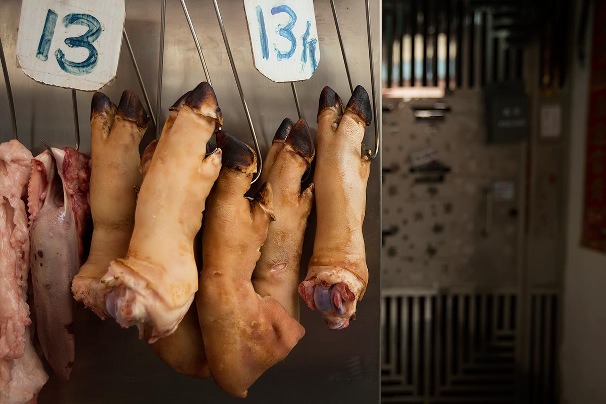 Cut off pig's feet at a wet market in Hong Kong.