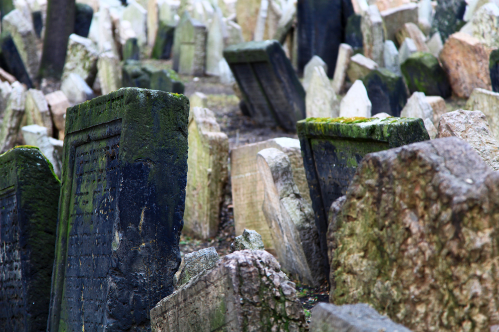 The numbers of grave stones and numbers of people buried at the Old Jewish Cemetery in Prague are uncertain because there are layers of tombs. However, it has been estimated that there are approximately 12,000 tombstones presently visible, and there may be as many as 100.000 burials in all.