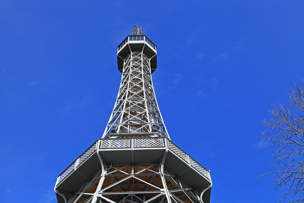 Petrin lookout tower is a 65 m high steel framework tower in Prague, which strongly resembles the Eiffel Tower. Although it is much shorter than the Eiffel Tower, it stands atop a sizable hill, Petřín, so the top is at a higher altitude than that of the Eiffel Tower.