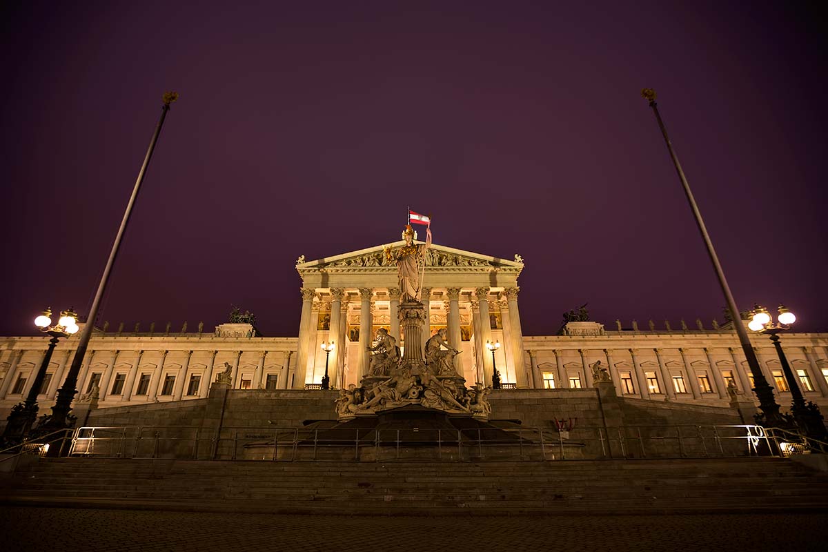 Just across the Hofburg palace sits the Austrian Parliament with the Pallas Athena fountain in front of the main entrance. Just across the Hofburg palace sits the Austrian Parliament with the Pallas Athena fountain in front of the main entrance.