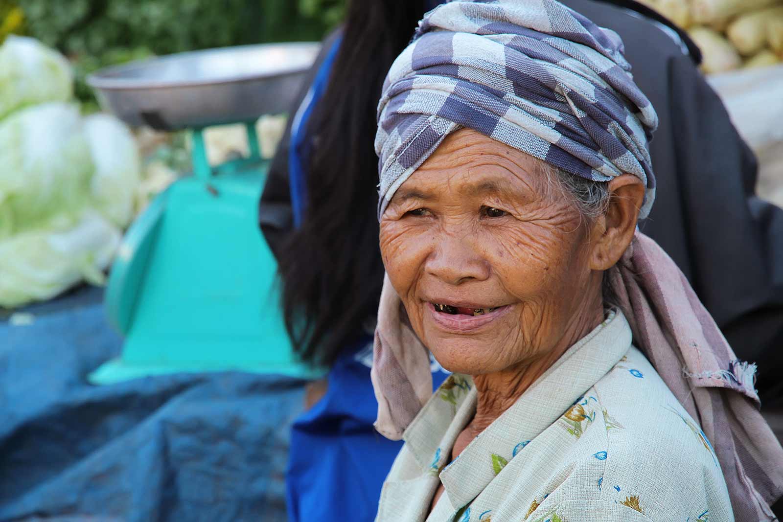 Market woman selling meat.