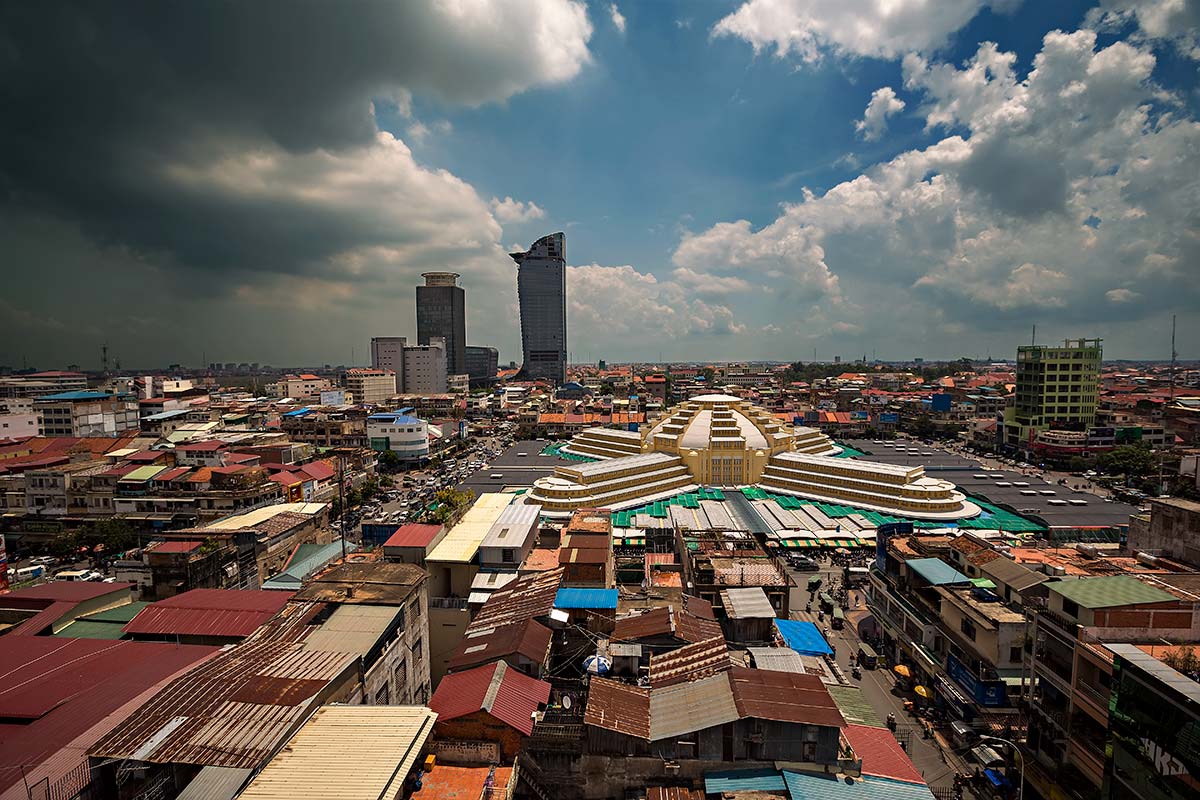 Phnom Penh's iconic Central market building in the front; Phnom Penh's highest skyscraper - Vattanac Capital Tower - in the back.