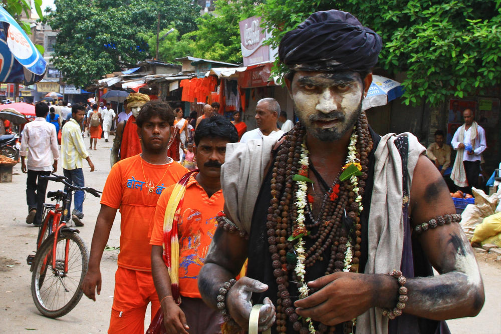 A man with war paintings in Varanasi, India.