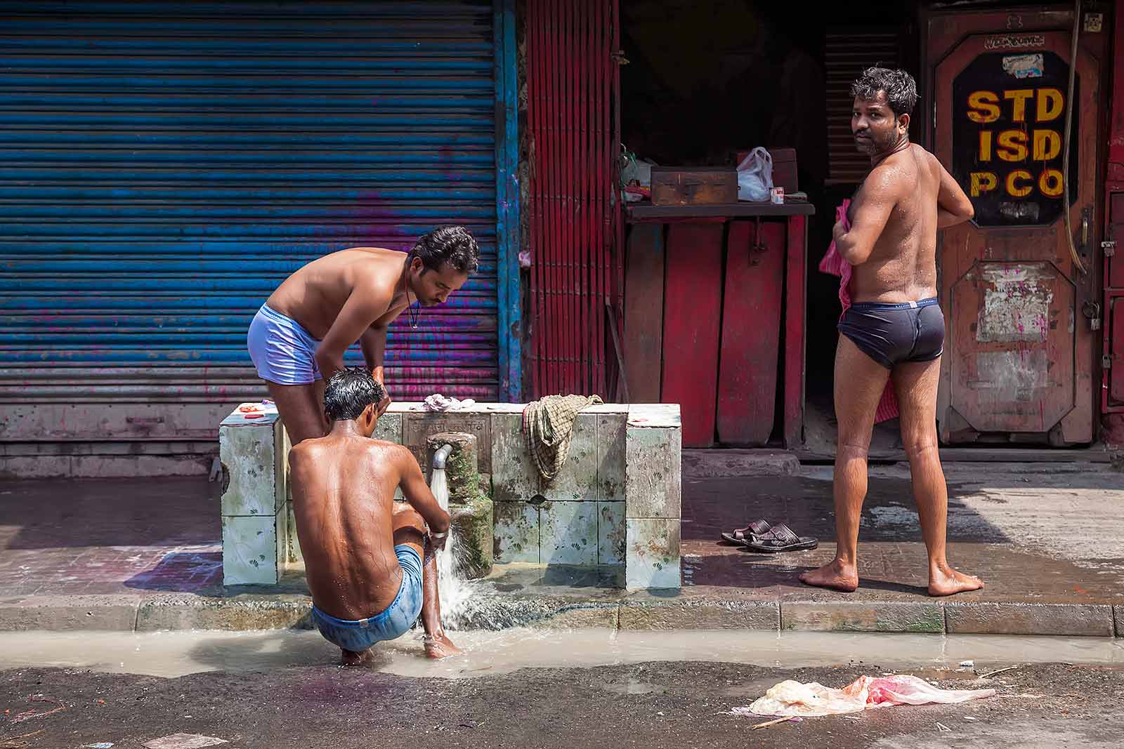 men-washing-streets-kolkata-west-bengal-india