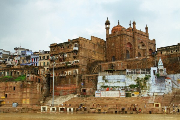 boat-ride-ganges-river-ghats-varanasi-india-2 The view of Varanasi from a boat ride on the Ganges river.