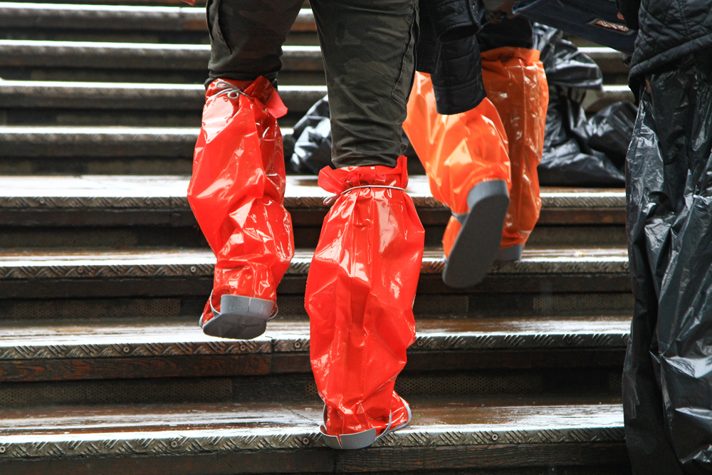 Rubber boots are a must during "Acqua Alta" in Venice, Italy.