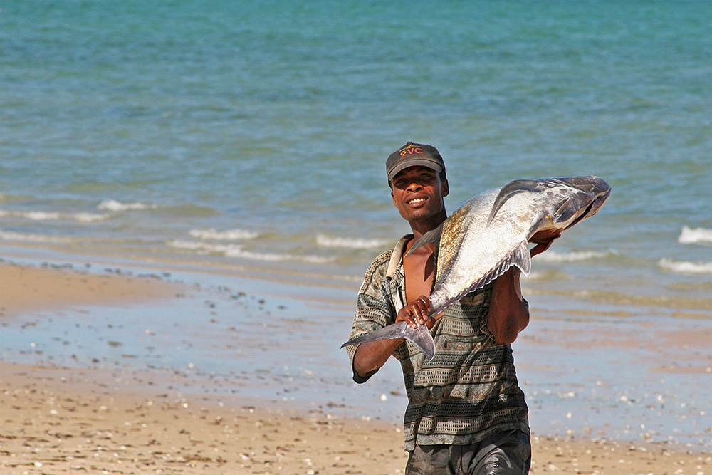 Fisherman on the beach near Bazaruto Island in Mozambique.