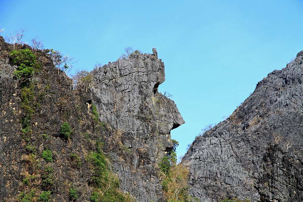 face-rock-thakhek-laos A mountain face near Thakhek, Laos.