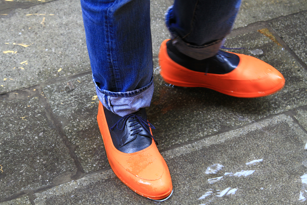 venice-under-water-shoe-style Interesting show styles during "Acqua Alta" in Venice, Italy.