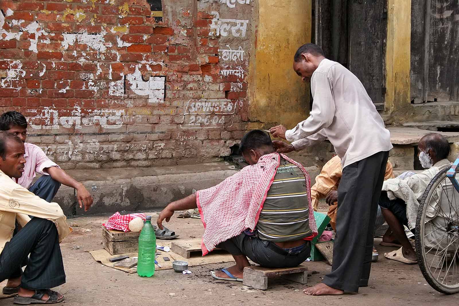 A barber shop in the streets of Varanasi, India.