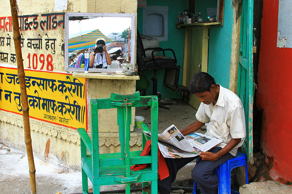 This barber in Varanasi is still waiting for customoers...