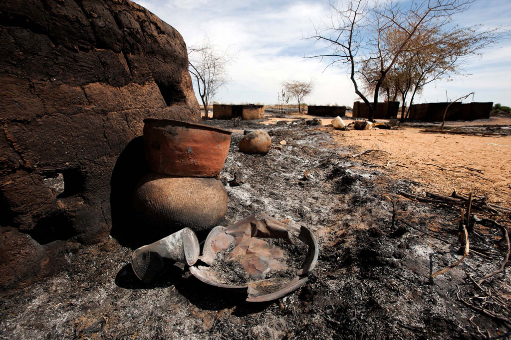 Destruction left behind after an attack on Sigili village, North Darfur. Photo: UNAMID/Albert González Farran