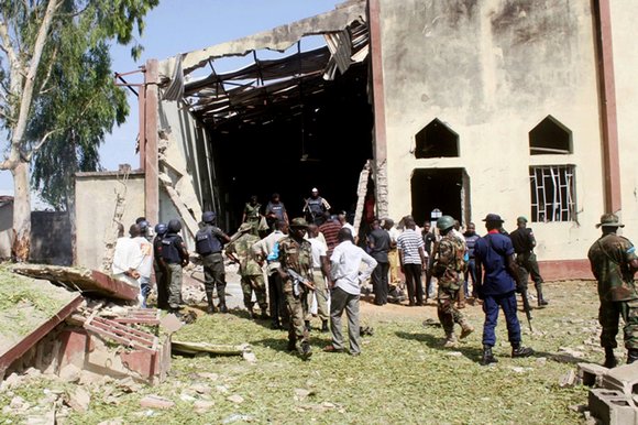 Associated Press - A suicide car bomber attacked a Catholic Church during Mass in Nigeria, killing at least 10 people.