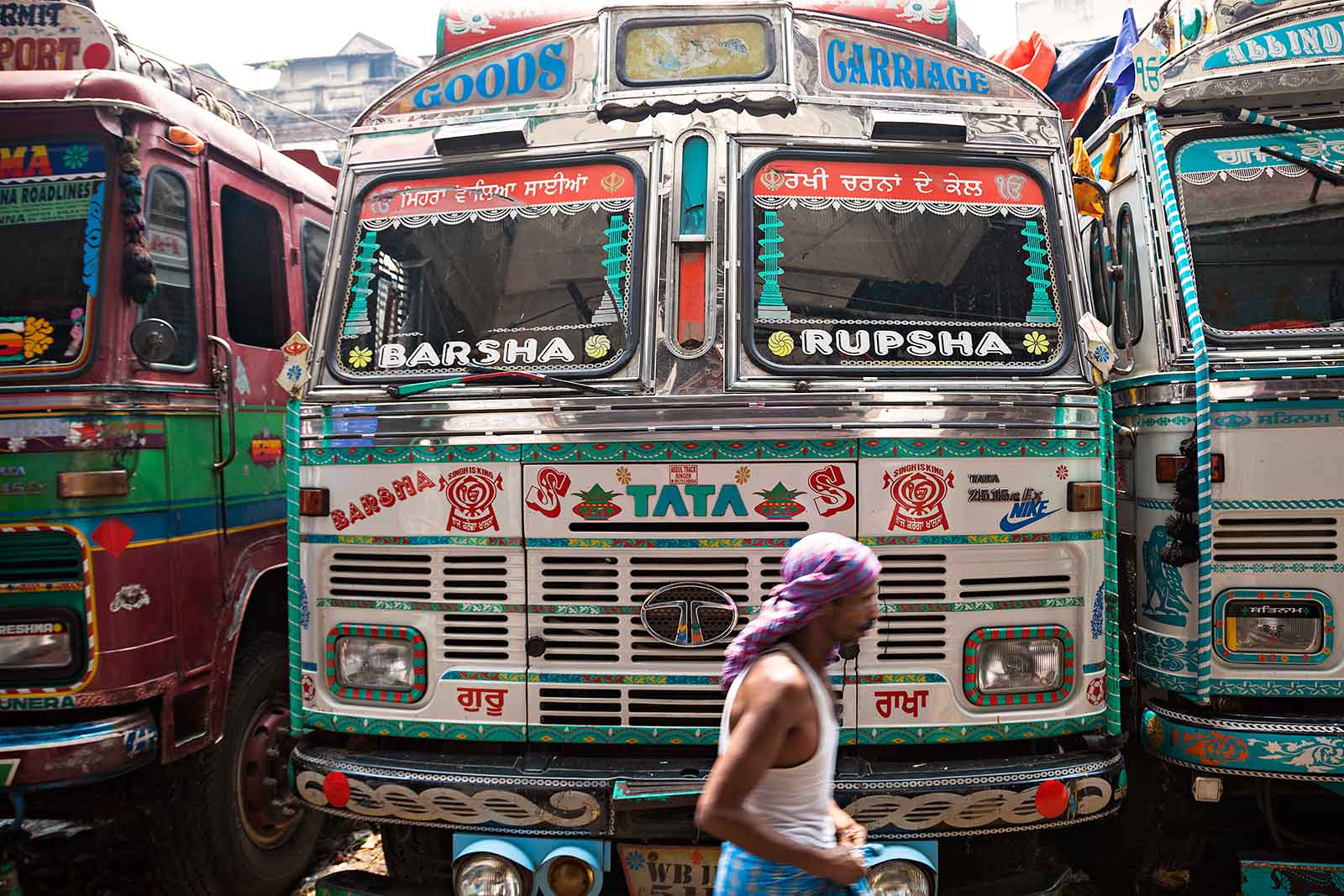 Working men at the the fruit wholesale market in Kolkata, India.