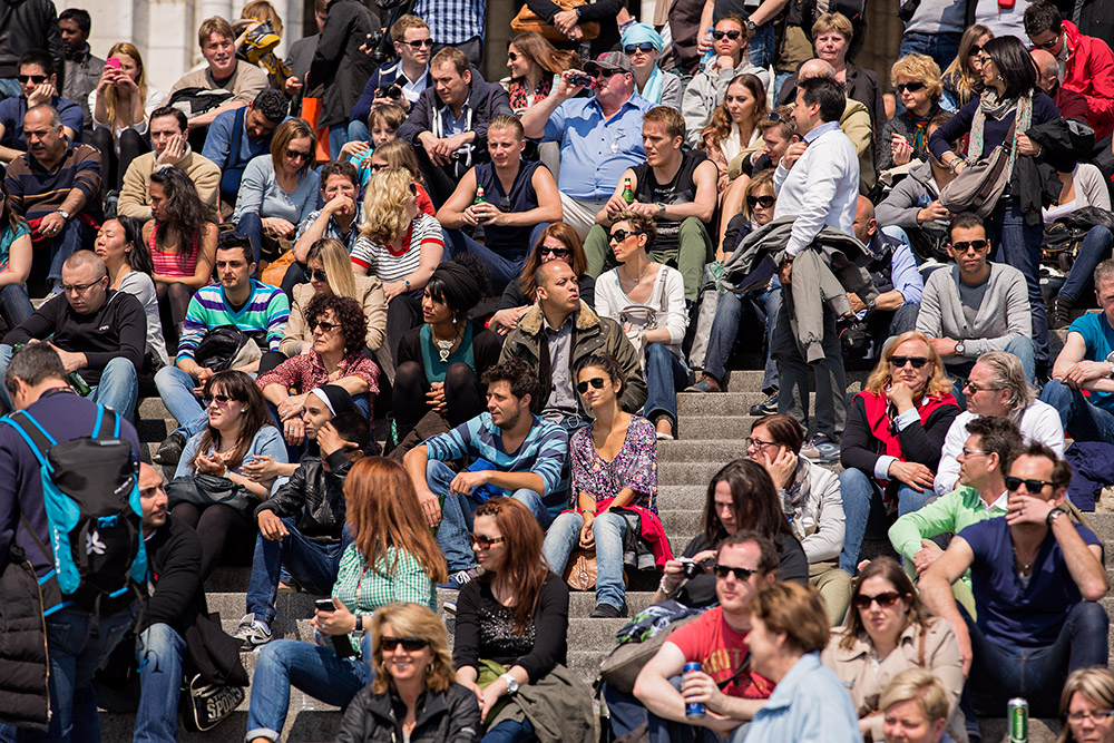 Crowds of people at the Basilica of Sacré-Cœur in Paris, France.