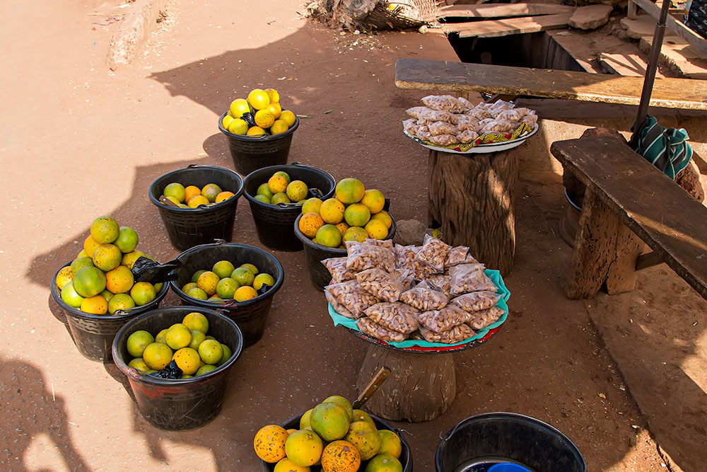 Fresh oranges and the most delicious cashew nuts at the market in Orodara, Burkina Faso.