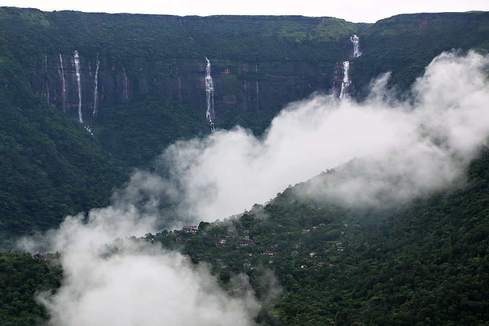 Nohkalikai Falls is the tallest plunge waterfall located in Cherrapunji, India. It's fed by the rainwater collected on the summit. Below the falls there has formed a plunge pool with unusual green colored water.