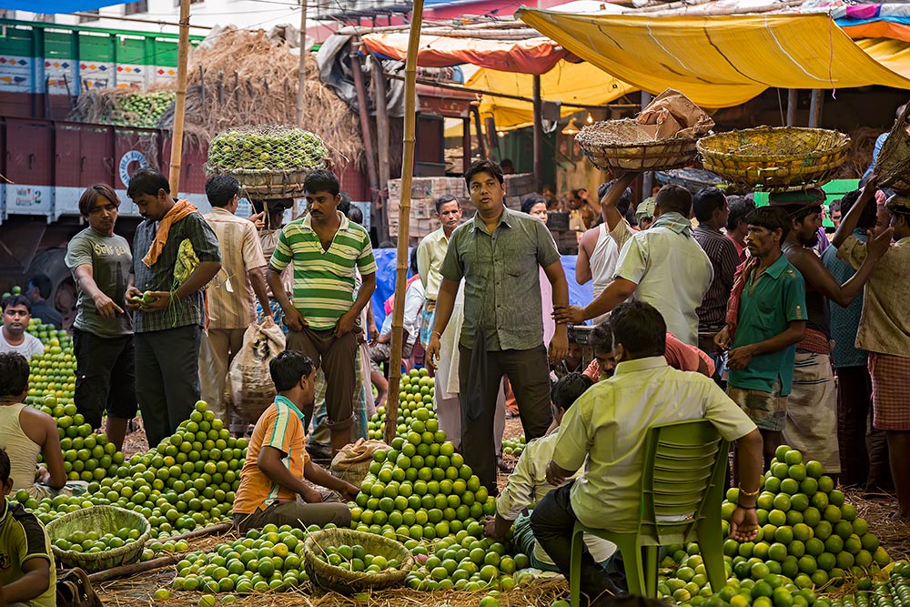 Hard working men at Mechua Market in Kolkata, India.