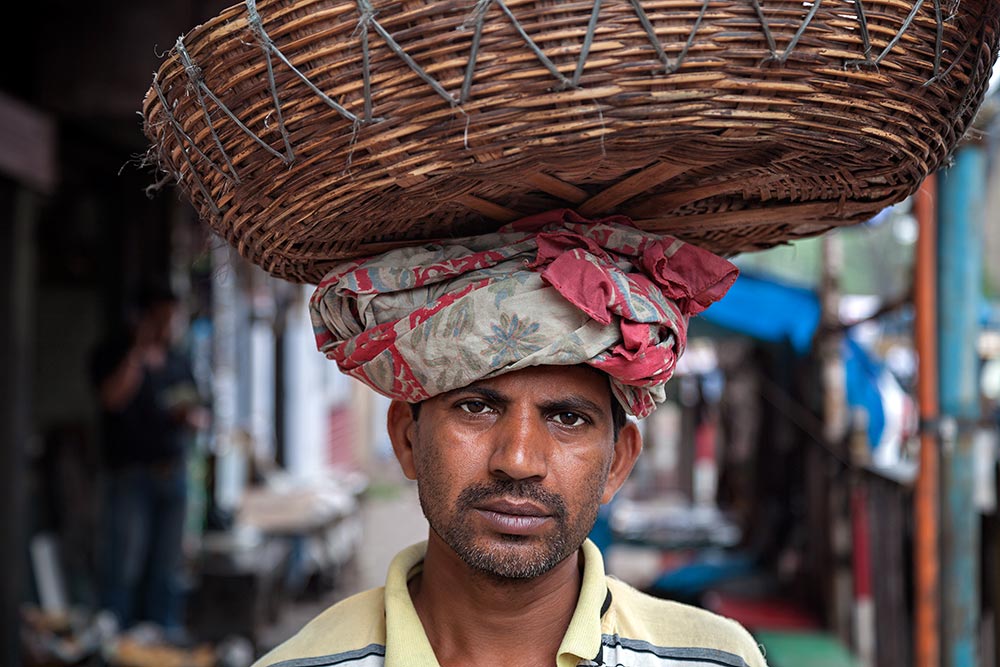 Portrait of a hard working man at Mechua Market in Kolkata, India