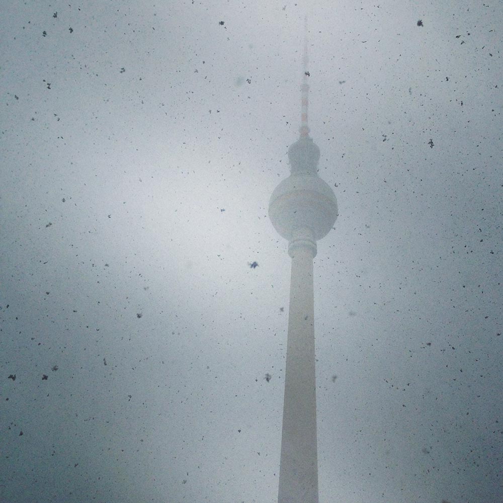 Windstorm "Xaver" made the first day in Berlin a bit ... uncomfy. But, we kept up the spirit and simply drank lots of "Glühwein" to keep warm. TV Tower on Alexanderplatz in Berlin, Germany.
