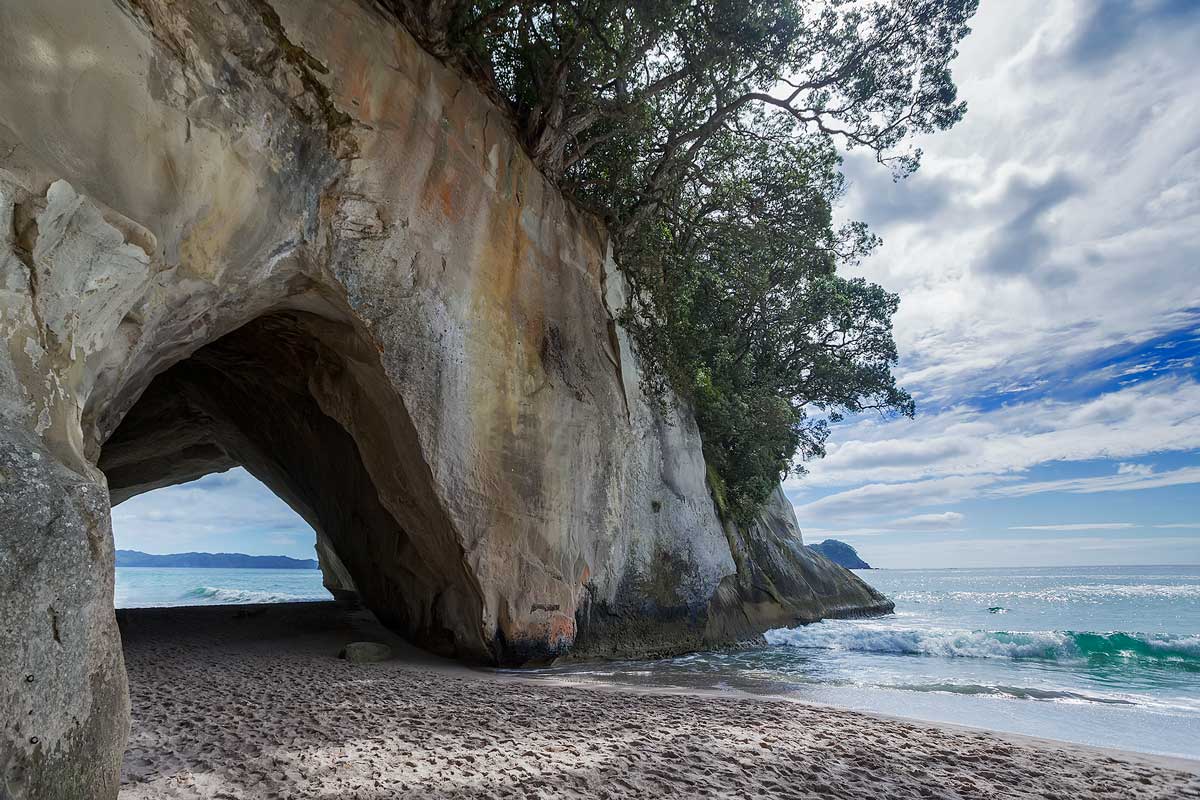 The famous Cathedral Cove. The cathedral-like arch gives whole area an air of grandeur.