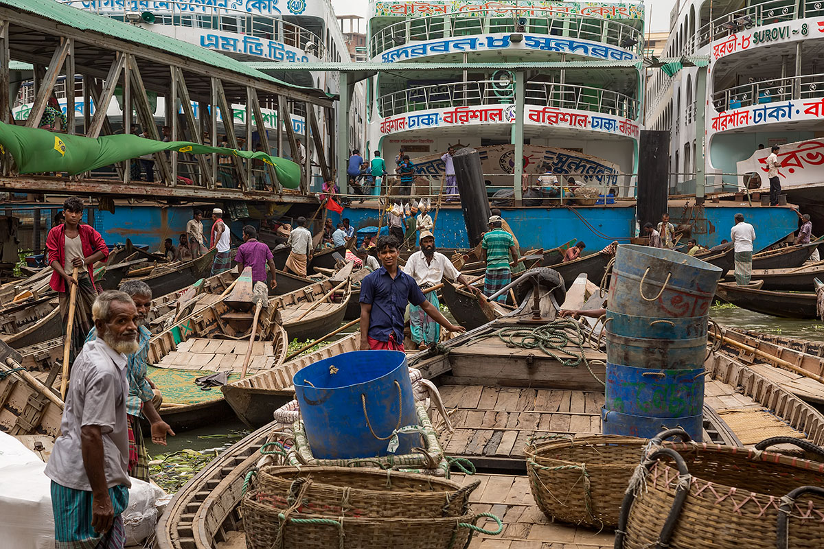 The daily chaos at Sadarghat port in Dhaka, Bangladesh. Ferrymen have to push for position in the queue to pick up passengers.