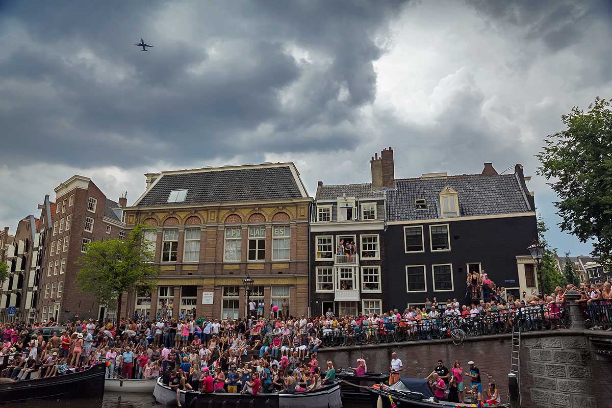 Even the planes diverted their route to fly over the Amsterdam Canal Parade.