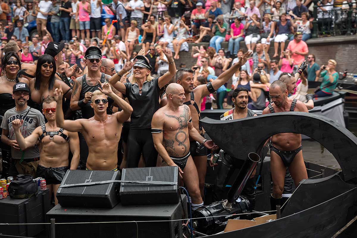 The party crowd didn't let a little rain get in the way of celebrating the 19th annual Amsterdam Pride Parade.