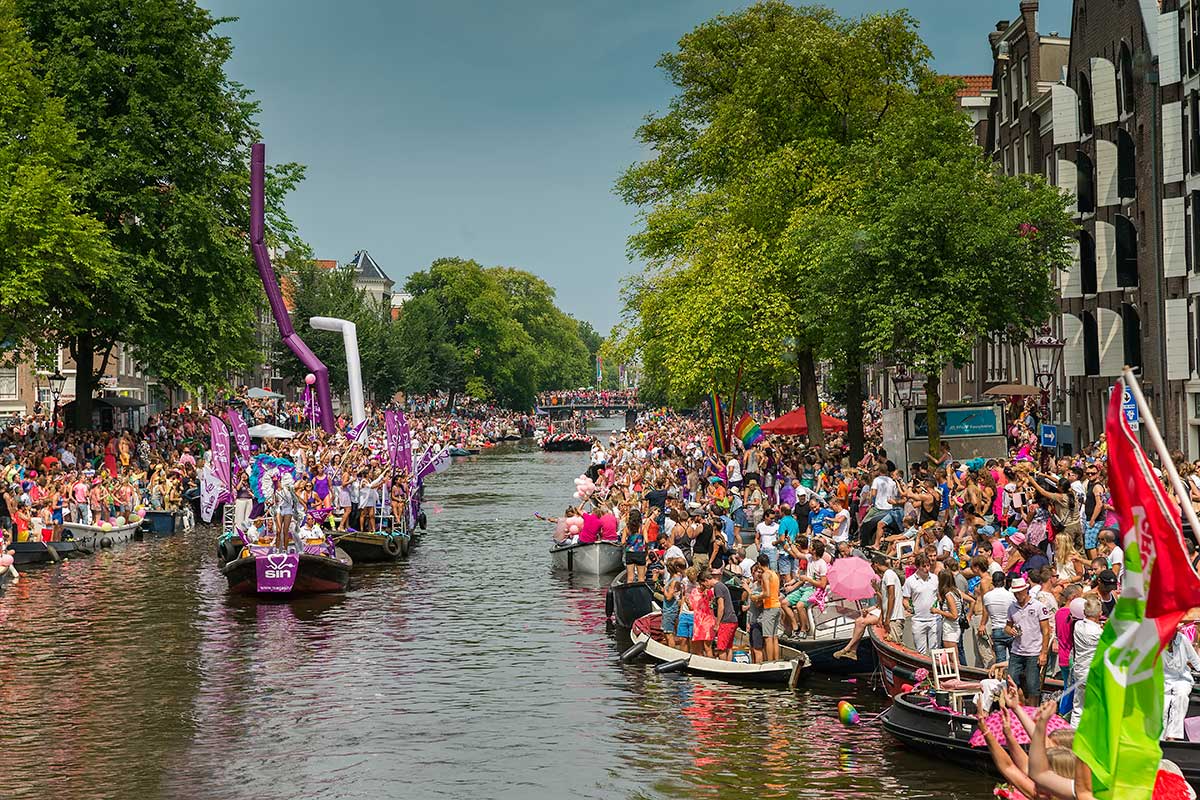 80 boats started from Westerkerk church down the Prinsengracht | Amsterdam Canal Pride Parade 2014.