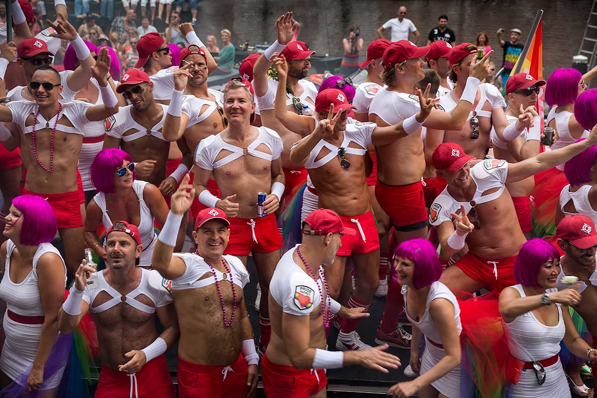 The Amsterdam Pride Parade shows people celebrate equality & freedom together.