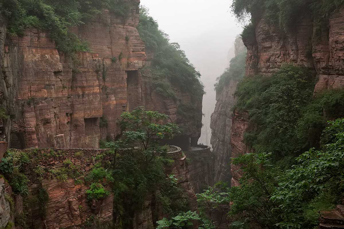 Guoliang Tunnel Road | One can feel the energy that these villagers needed to built this road. There are a few examples of these carved mountain roads in the area and we were speechless by this fascinating achievement.