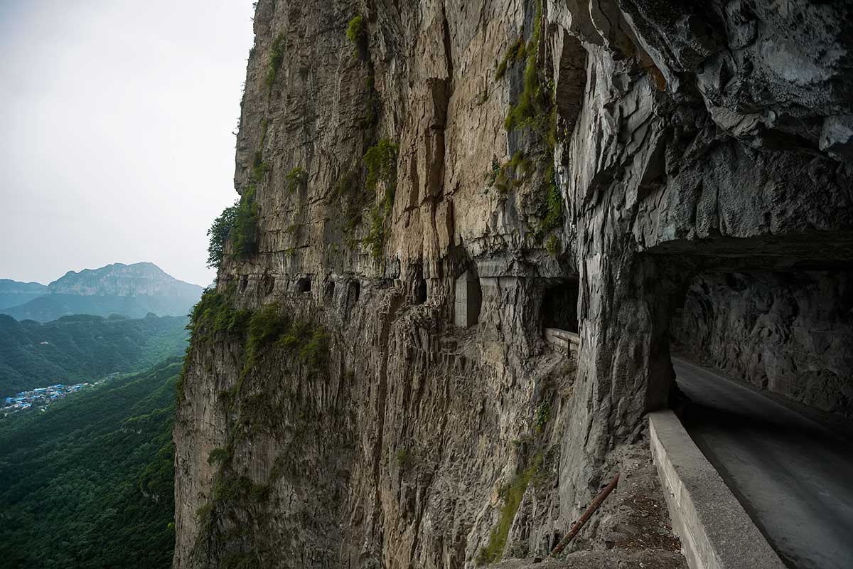 Guoliang Tunnel Road | It's a tight squeeze for vehicles, twisting past the tunnel’s "windows" which provide stunning views hundreds of feet below.