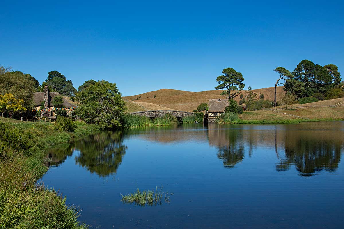 Hobbiton in Matamata, New Zealand. Hobbiton is located near the base of the Kaimai Ranges, and is a thriving farming area.