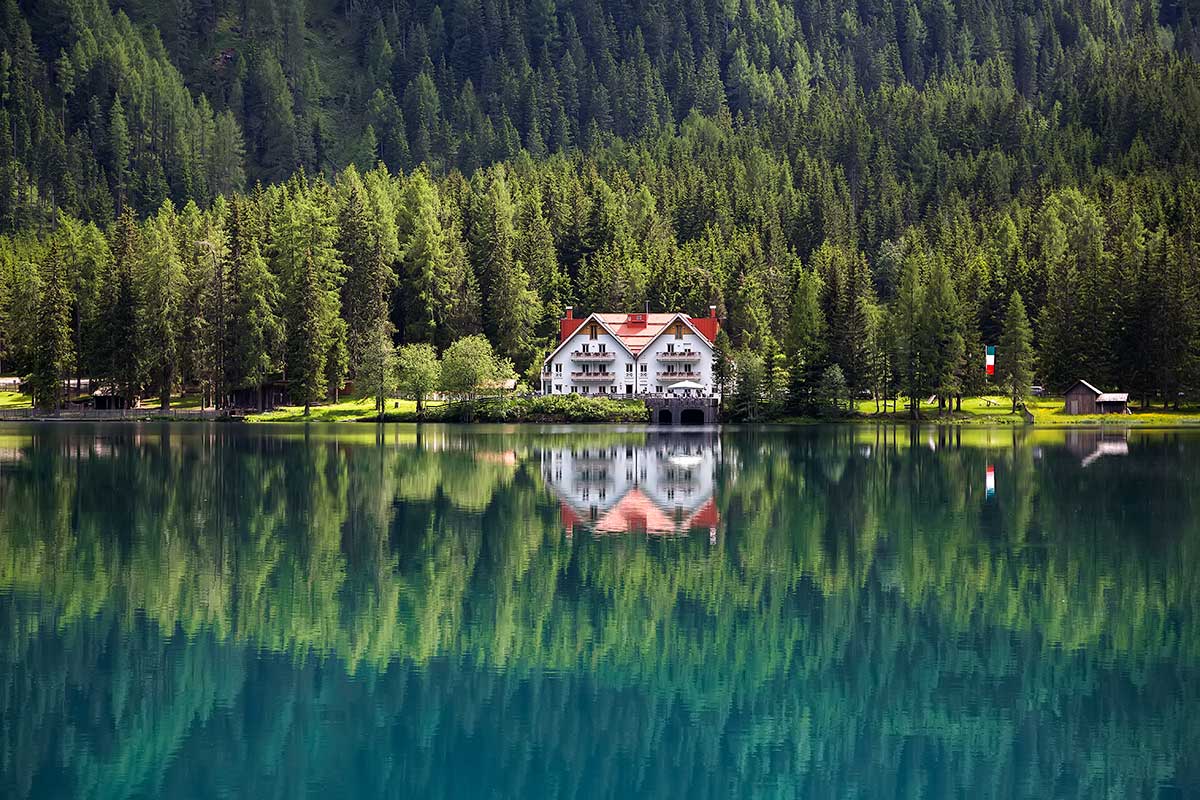 Reflection at the Antholzer See in South Tyrol, Italy.