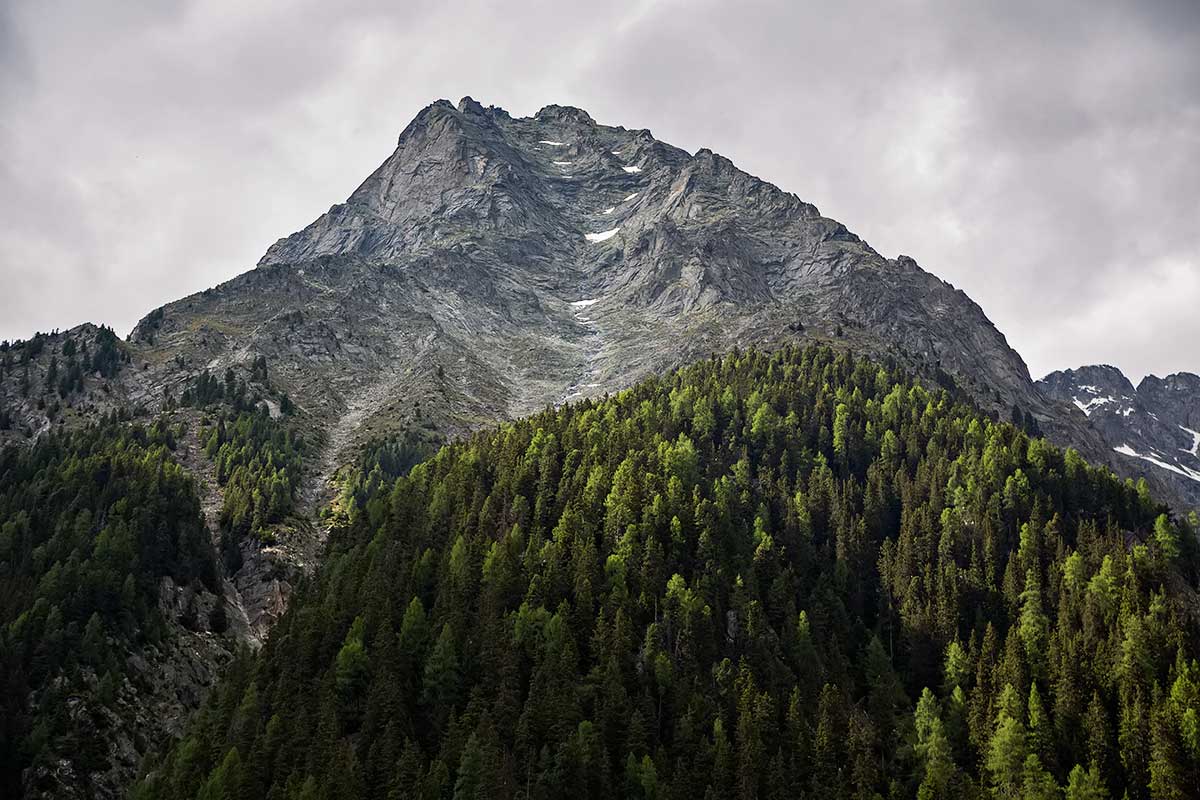 Striking mountains at the Antholzer See in South Tyrol, Italy.