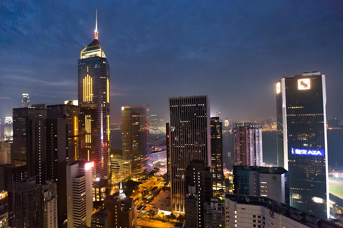 Hong Kong Skyline view up from the Wooloomooloo rooftop bar in Wan Chai.