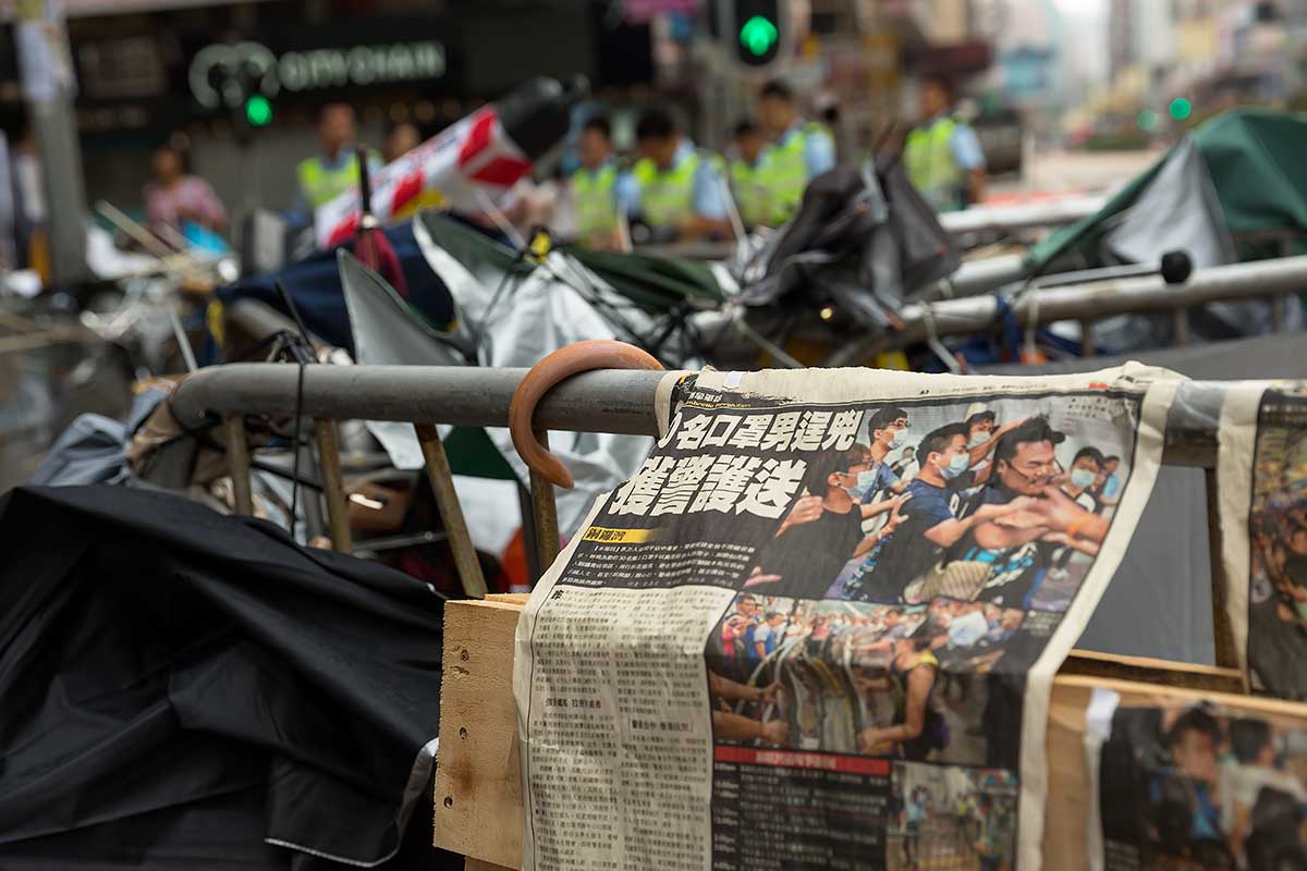 The Umbrella Movement in Hong Kong entered a new phase as police took assertive action to clear protests camps in the Mong Kok district.