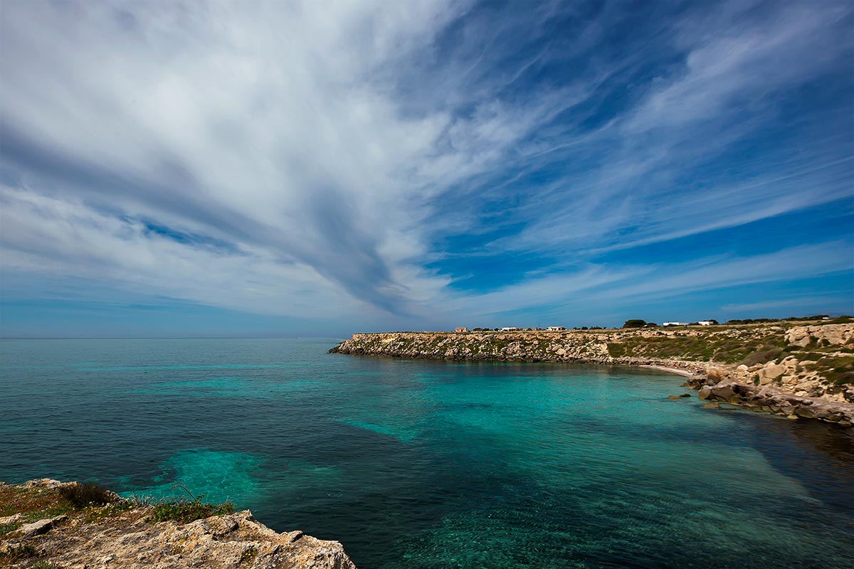 Cala Rossa beach on Favignana island lies a pretty bay with turquoise sea and is one of the most visited beaches of the island.